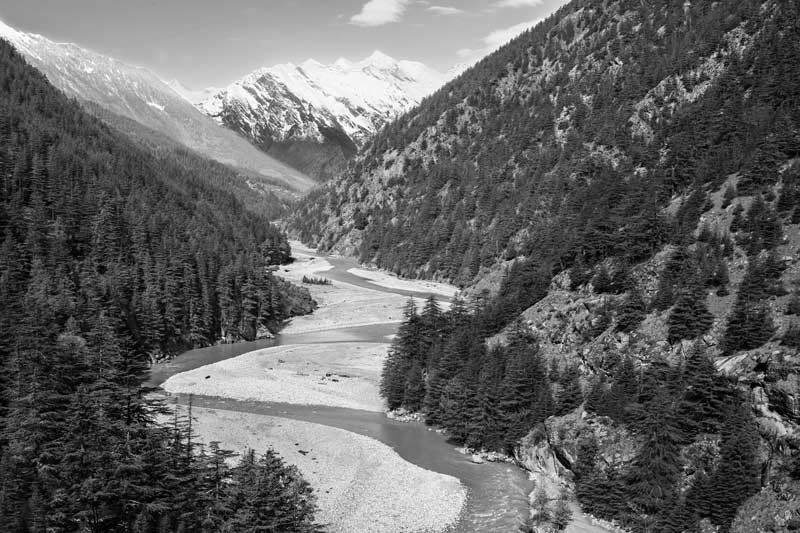 River Bhagirathi – one of the headstreams of Ganga – meandering its way through valleys separating the high peaks of the Himalayas in Uttarkashi district, Uttarakhand